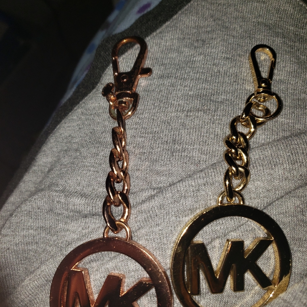 Michael kors charms one gold and one rose gold